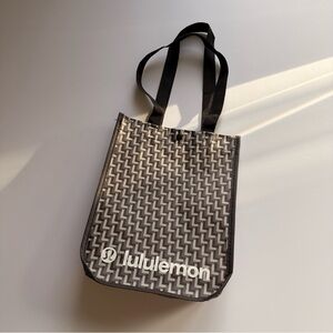 Lululemon  holiday tote shoulder bag White 9" x 12" clasp closure